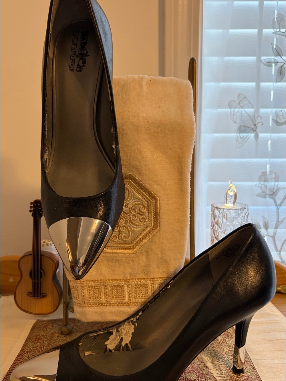 Coach and Four Black Leather Pointed Toe Pumps with Silver Cap Toe